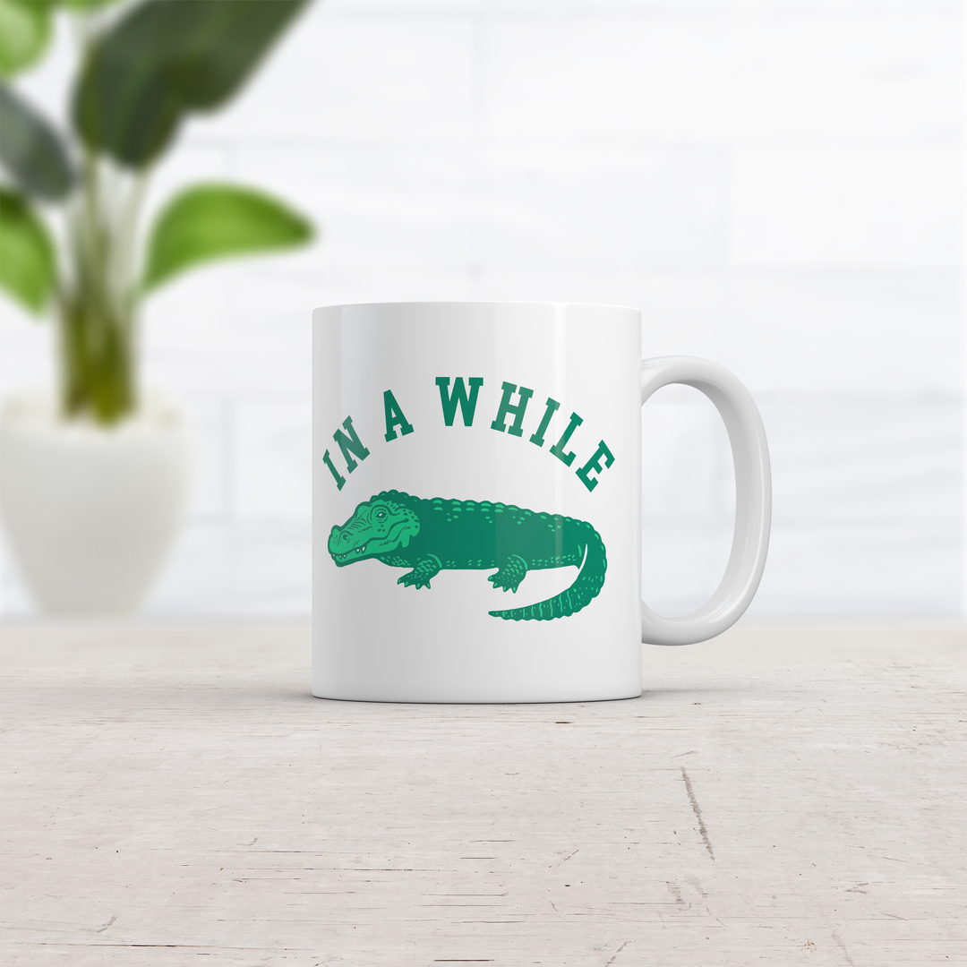 In A While Crocodile Mug