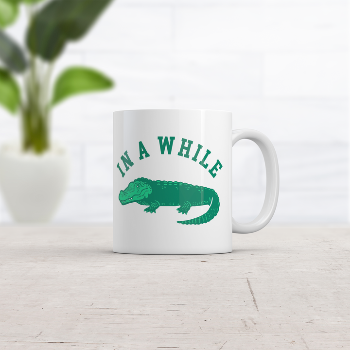In A While Crocodile Mug