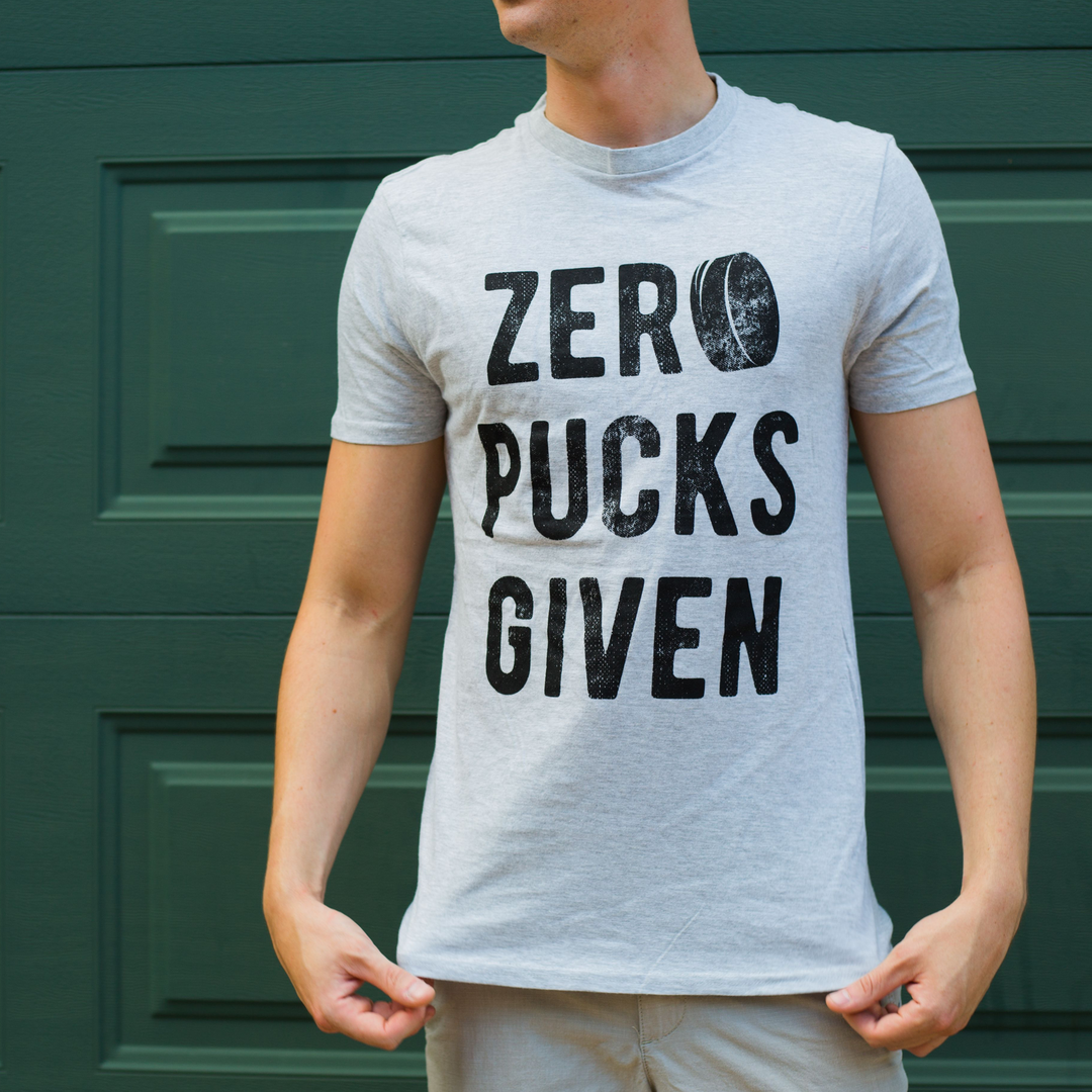 Man Wearing a zero pucks given printed shirt