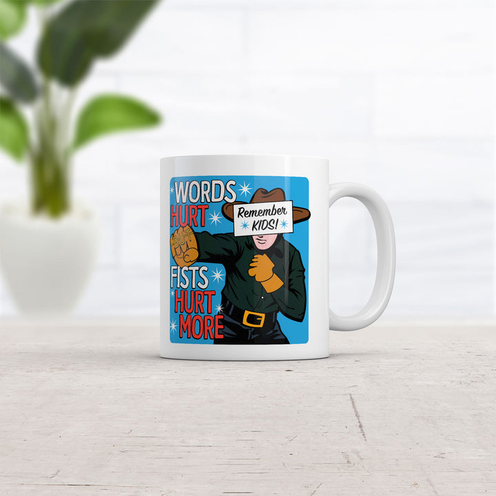 Words Hurt Fists Hurt More Mug